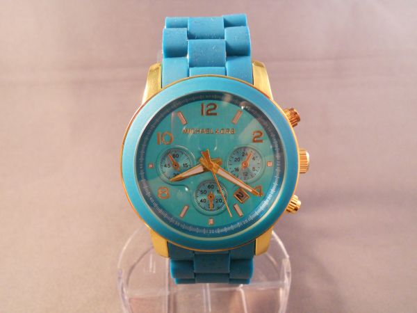 Relógio réplica MK azul turquesa